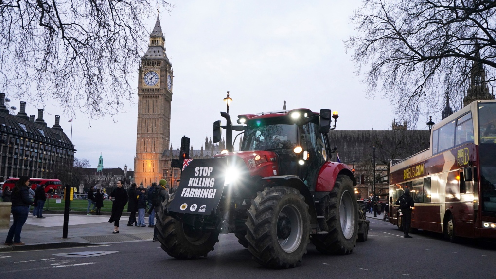 British farmers in tractors march to Parliament to voice concerns about rules jeopardizing their livelihoods